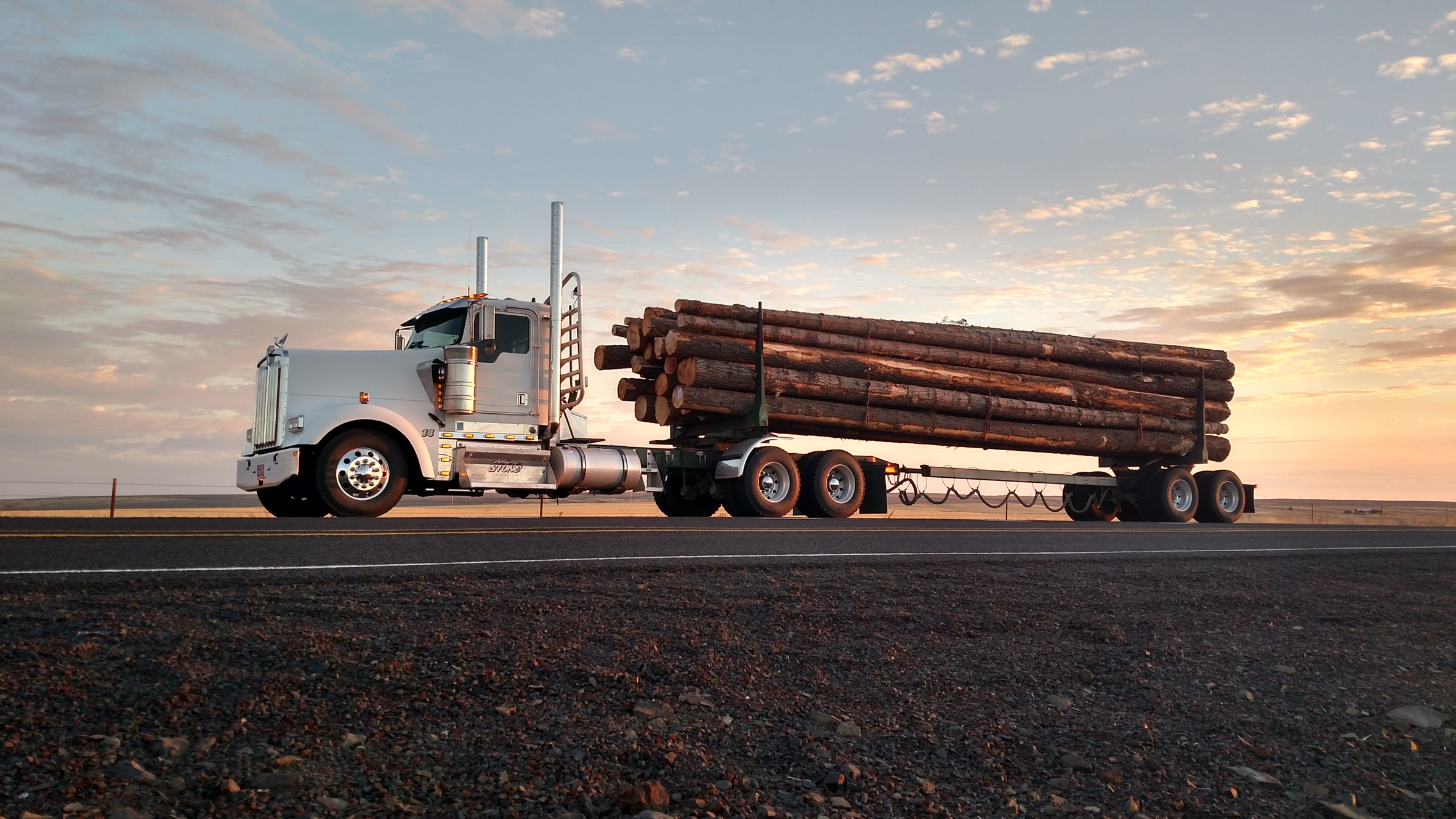 Wayne Stone operates nine log trucks & two lowboys under Wayne Stone Trucking, LLC